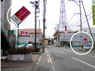 左手に当ホテル、右手に駐車場が見えます。